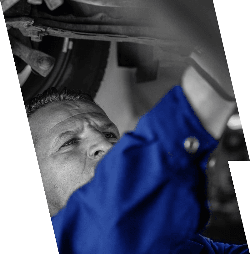 Auto Repair Mechanic working under car in Kirkland WA